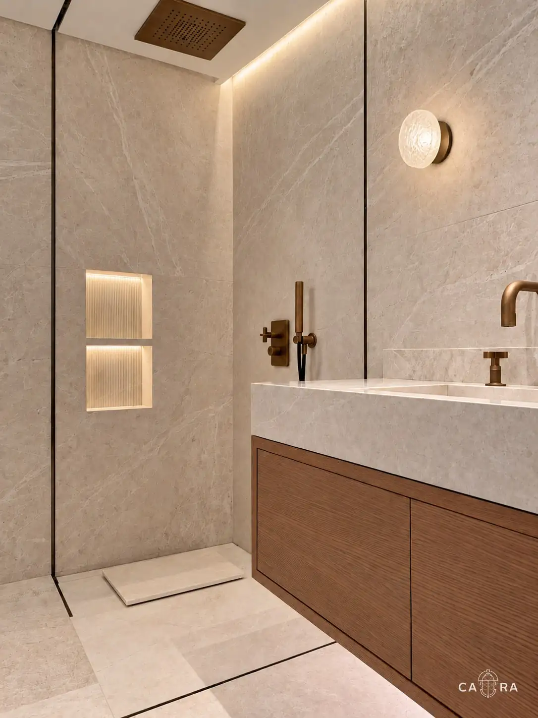 Bathroom with walnut vanity, stone basin and bronze tap